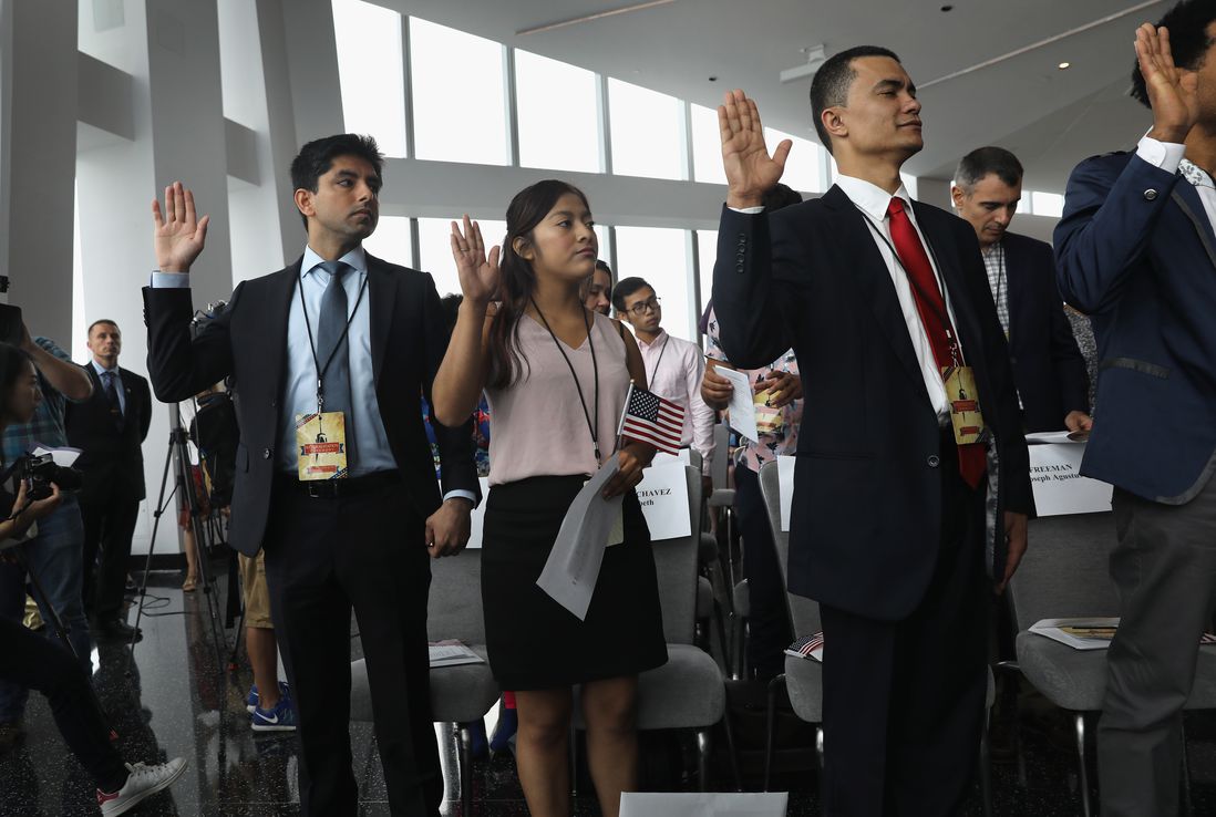 Immigrants take the oath of allegiance to the United States at a naturalization ceremony held in the observatory of the One World Trade Center <br>